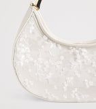 Simkhai Nixi embroidered mesh clutch bag, imported from the UK