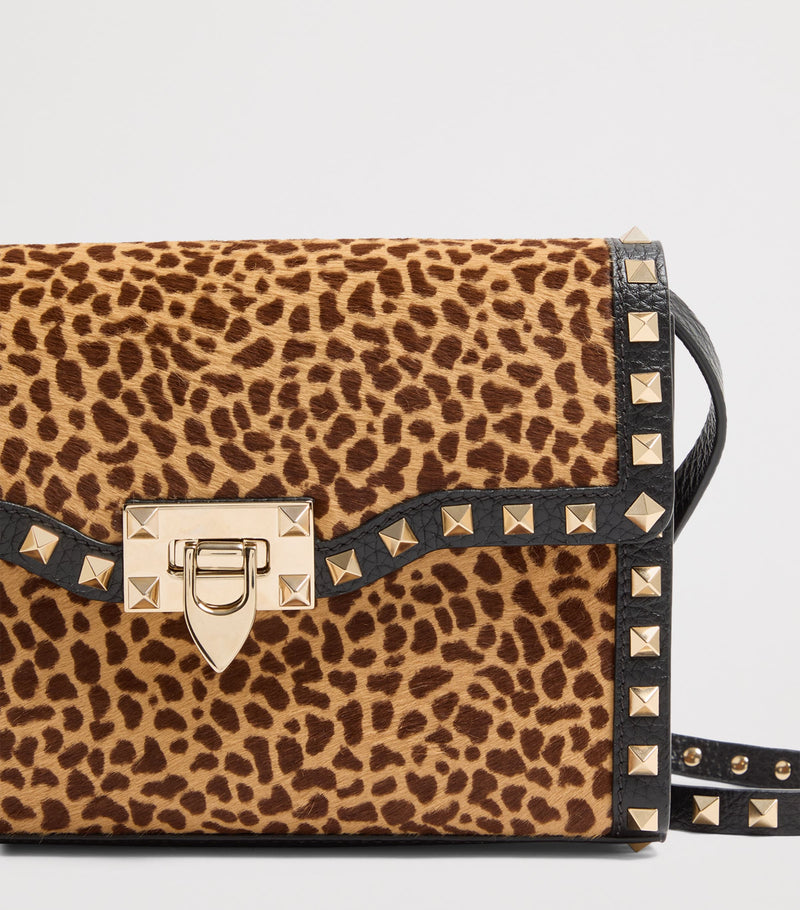 Valentino Garavani small leather rockstud shoulder bag (British brand)