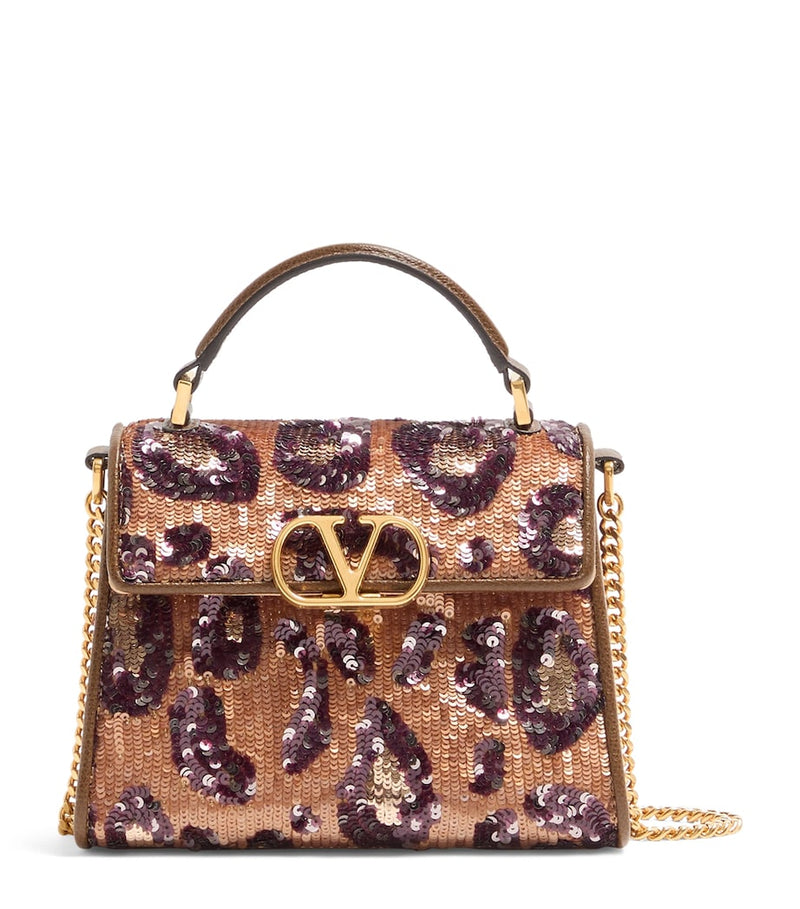 Valentino Garavani mini silk embellished VSLING top-handle bag, UK version