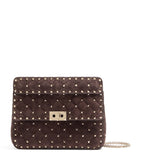Valentino Garavani Rockstud Spike medium leather top-handle bag - British product