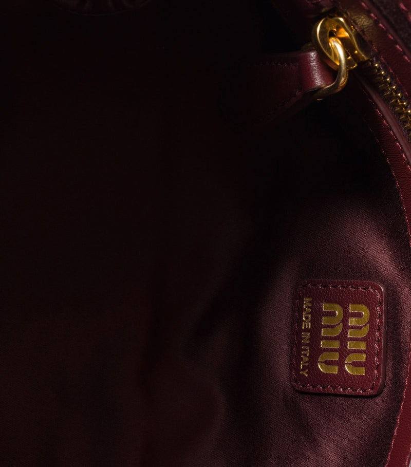 Miu Miu matelassé leather clutch bag, UK version