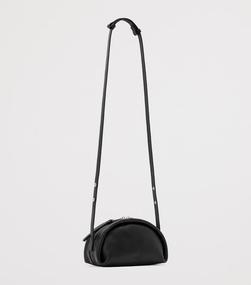 AllSaints Rosalie Arc cross-body bag in calfskin leather, imported from the UK