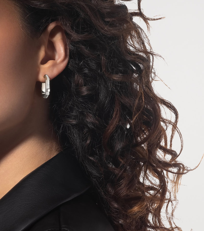 Messika Modernist white gold diamond hoop earring, imported from the UK