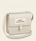 Cartier mini leather shoulder bag with enamel clasp, UK version