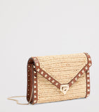 Valentino Garavani mini straw Rockstud cross-body bag - British product