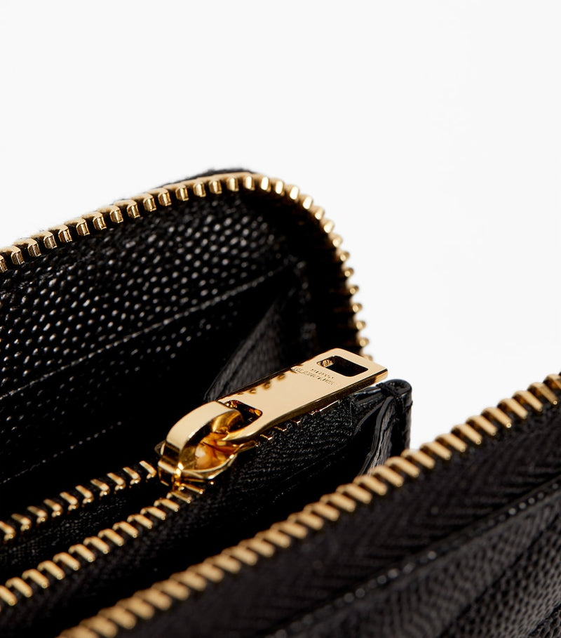 Saint Laurent matelassé leather wallet with YSL monogram (British brand)
