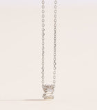 Suzanne Kalan Infinite pendant necklace in white gold and diamonds, UK version