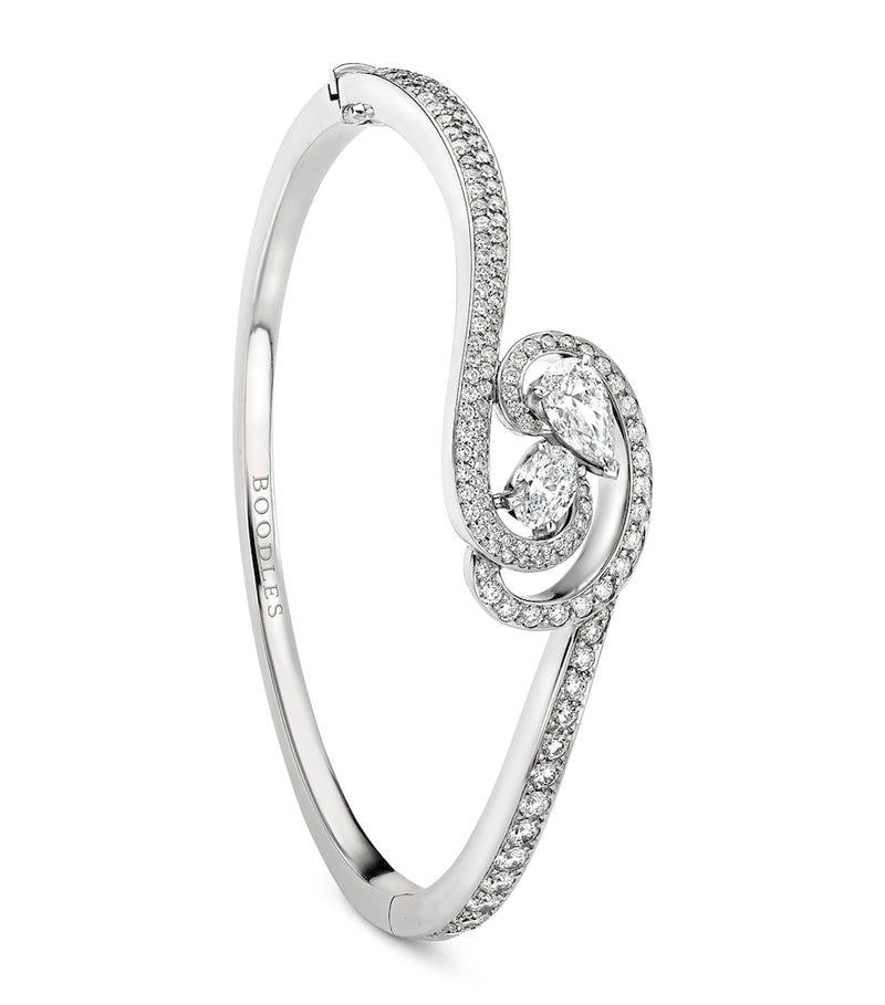 Boodles platinum bangle with pearl and diamond (British brand)