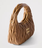 Miu Miu Matelassé Leather Wander Top-Handle Bag (British brand)
