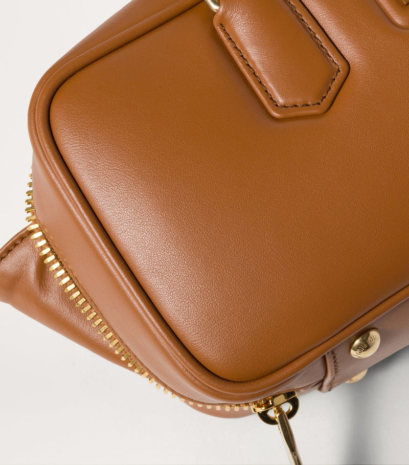 Miu Miu Arcadie top-handle bag in calfskin leather, imported from the UK