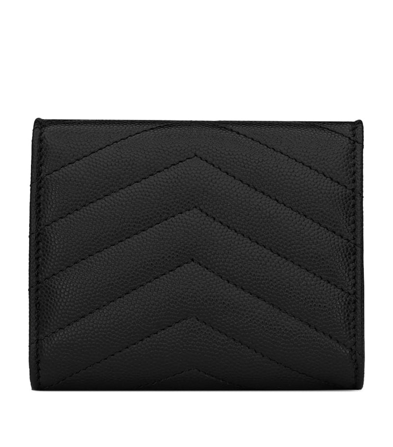 Saint Laurent leather quilted trifold wallet with YSL monogram, imported from the UK