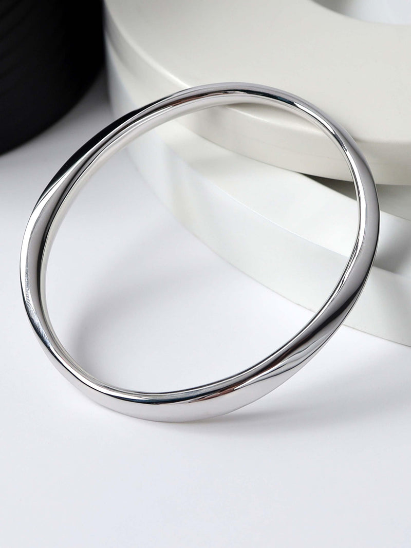 Kit Heath sterling silver Bevel Cirque bangle with classic design, UK version