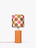 Orla Kiely scallop table lamp in terracotta, imported from the UK