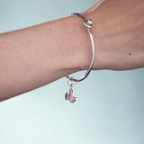 Recognised sterling silver dove bangle, imported from the UK