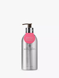 Molton Brown fiery pink pepper bath and shower gel in recycled aluminium bottle, 400ml, imported from the UK
