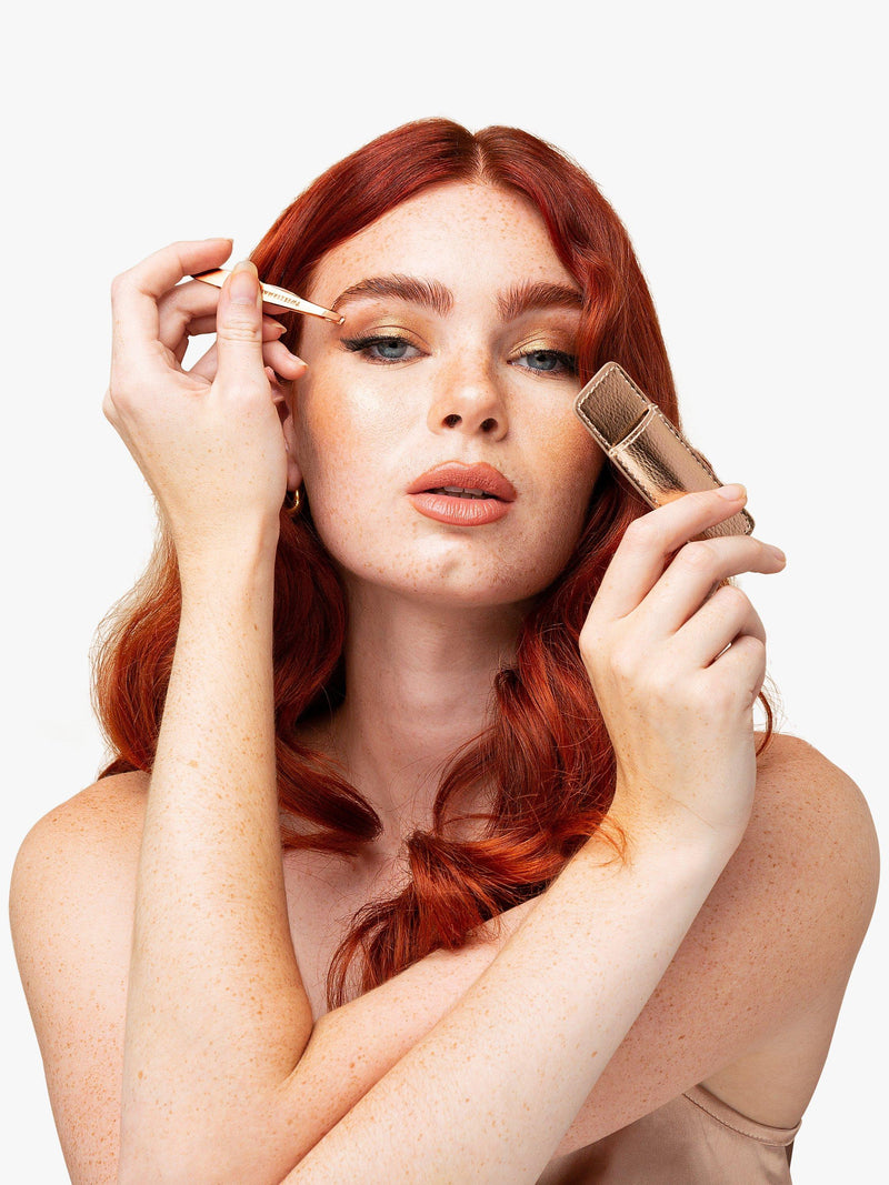 Tweezerman rose gold mini slant tweezers, imported from the UK