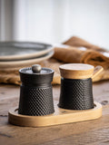 Peugeot Bali Spice Palace cast iron and bamboo pepper and salt mill set in matt black, imported from the UK