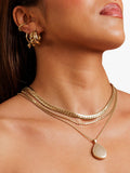 LARNAUTI gold pebble locket necklace, imported from the UK