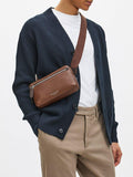 Aspinal of London compact pebble leather reporter bag, UK version