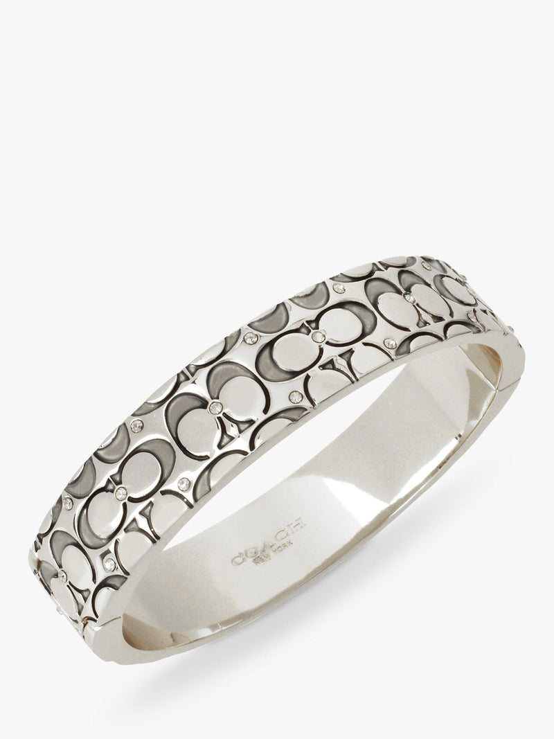 Coach silver crystal bangle with hinged closure, imported from the UK