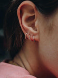 Edge of Ember 14ct gold huggie hoop earrings with sapphires (British brand)