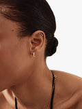 Edge of Ember 14ct gold opal huggie hoop earrings (British brand)