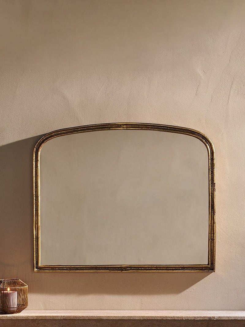 Nkuku Almora arched overmantel mirror antique brass finish - British product