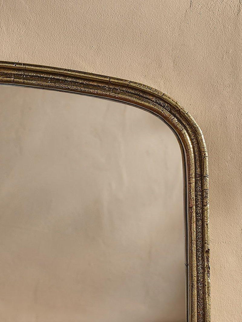 Nkuku Almora arched overmantel mirror antique brass finish - British product
