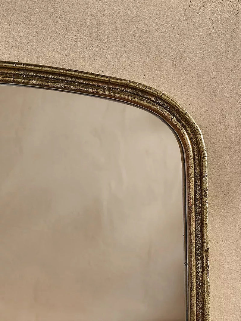 Nkuku Almora arched overmantel mirror antique brass finish - British product