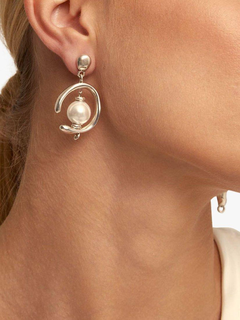 UNOde50 pearl asymmetric drop earrings in silver, imported from the UK