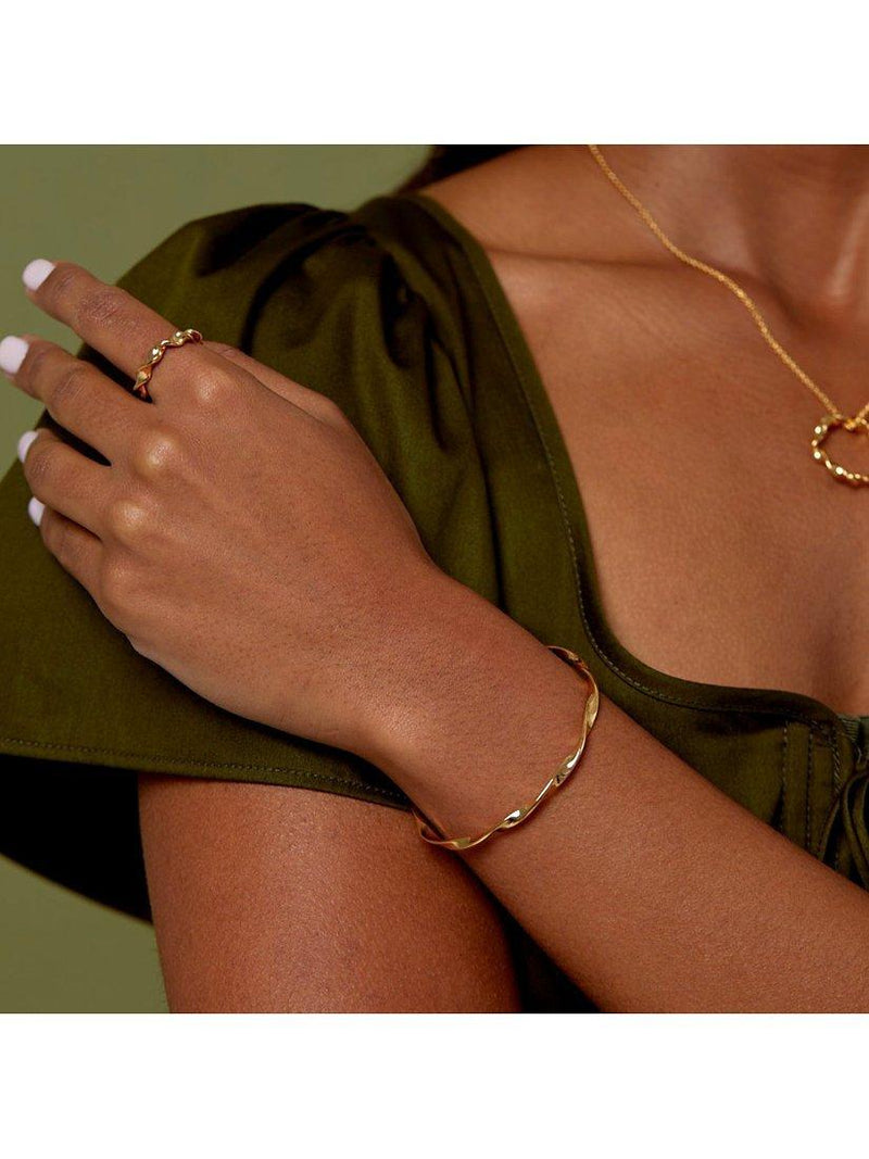 Orelia ribbon twist bangle gold plated (British brand)