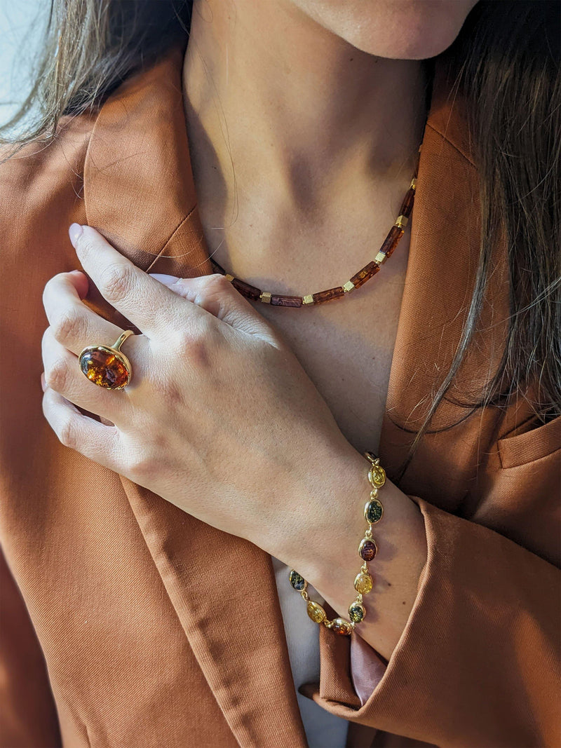 Be-Jewelled Baltic amber oval cabochon ring in Gold/Cognac, imported from the UK
