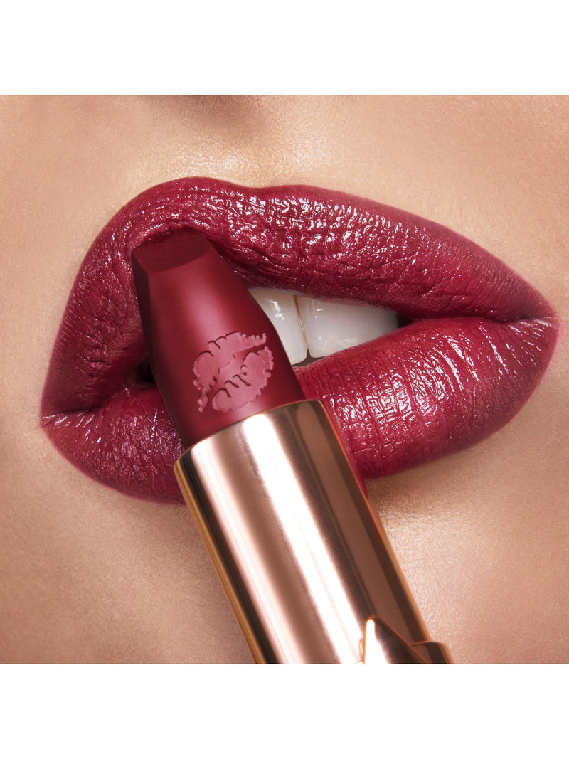 Charlotte Tilbury deep berry-red lipstick in Ready For Lust shade - British product