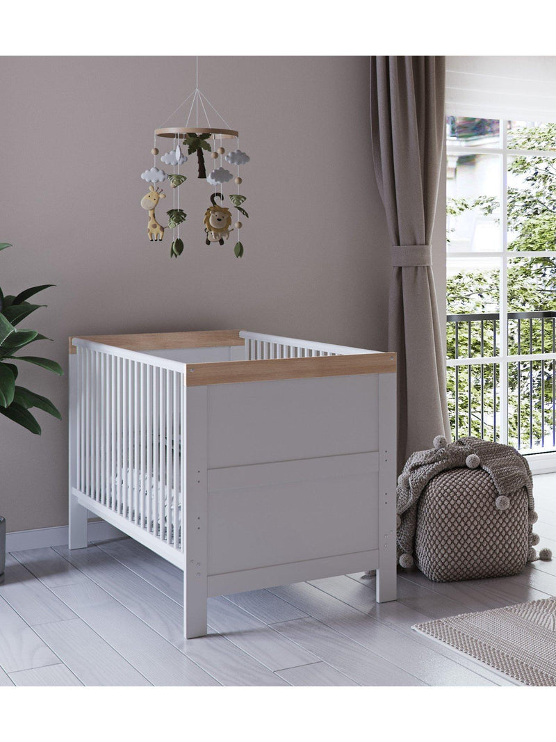 Little Acorns convertible cotbed in white and oak finish, UK version