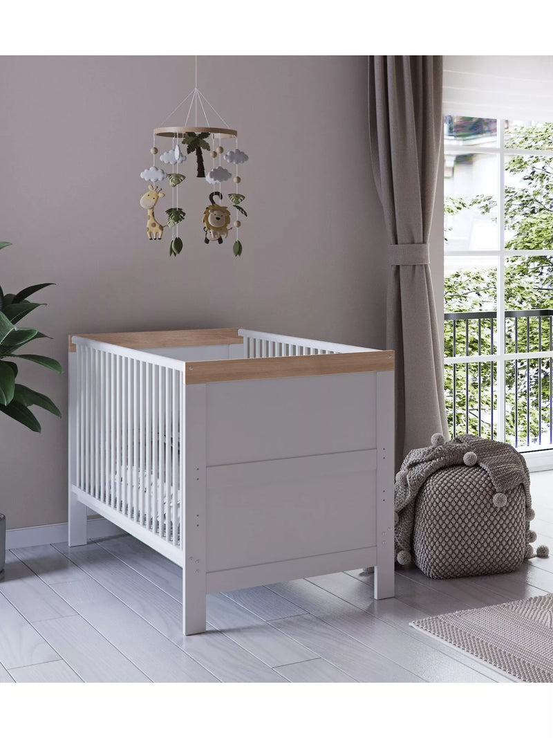 Little Acorns convertible cotbed in white and oak finish, UK version