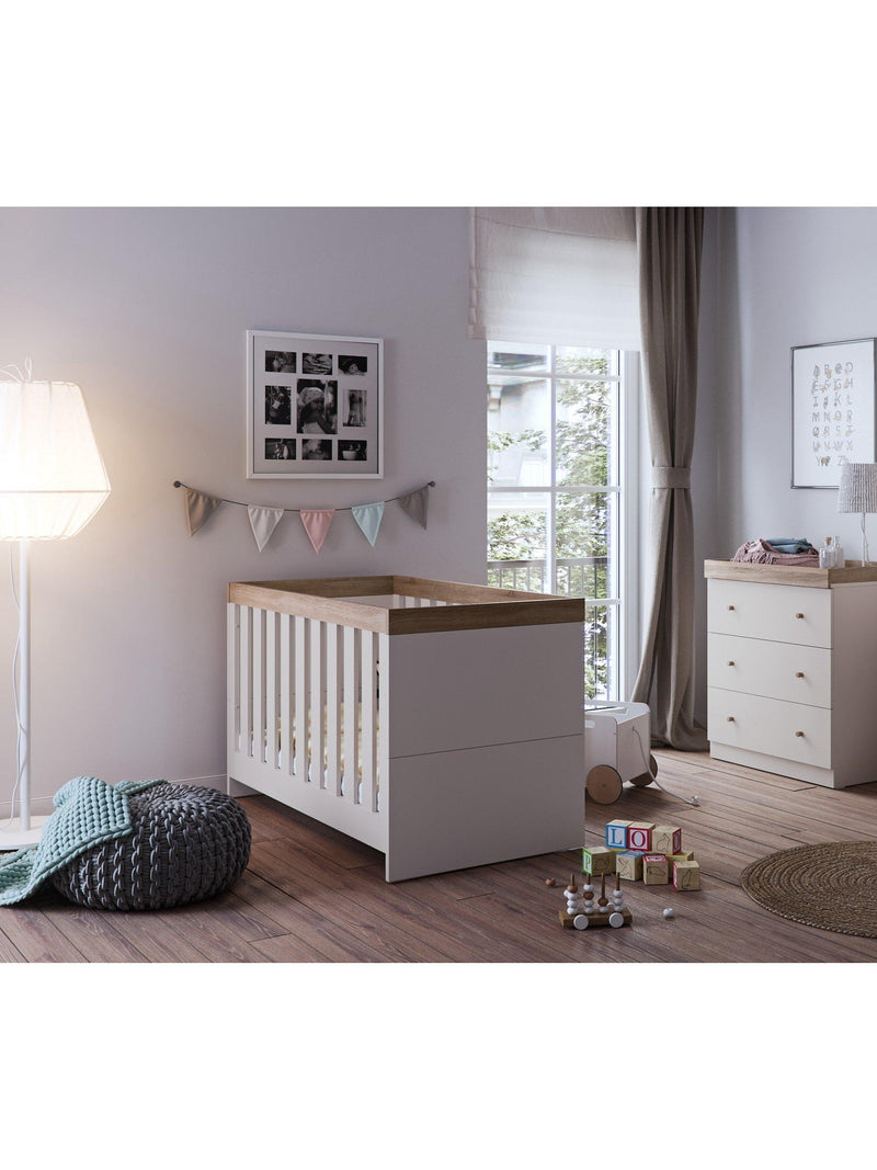 Little Acorns Burlington Cotbed featuring oak accents and MDF finish, UK version
