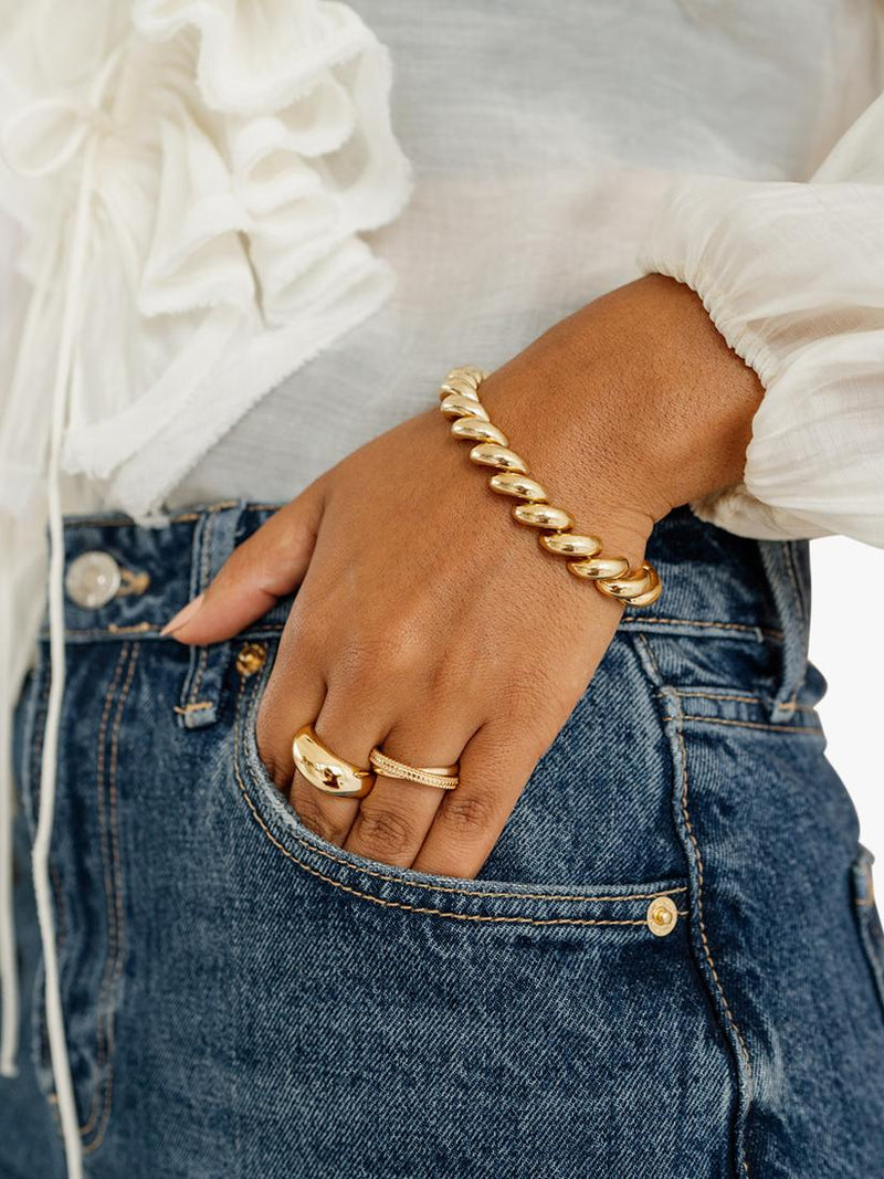 LARNAUTI San Marco gold curved spiral bracelet imported from the UK