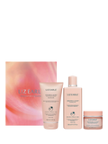 Radiant glow skincare gift set with gel cleanser, exfoliating tonic, and illuminating moisturiser, UK version