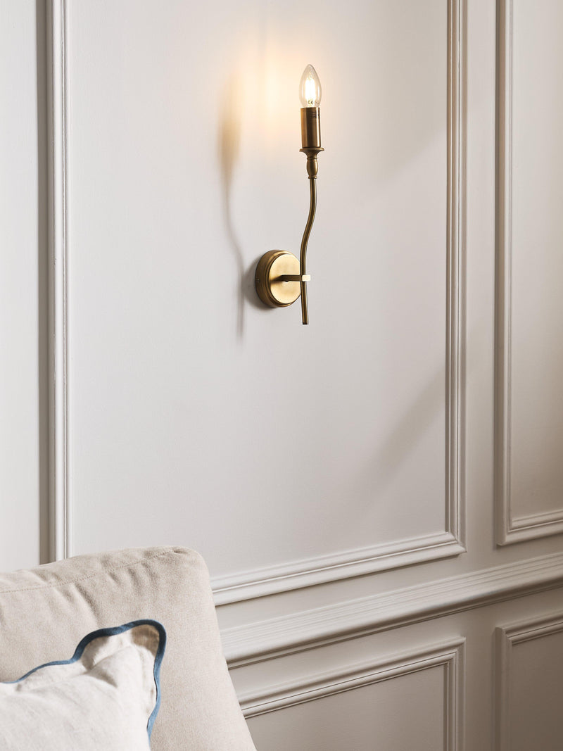 John Lewis Elk wall light fitting in matt antique brass, imported from the UK