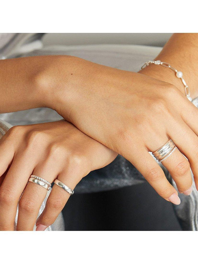 Daisy London topaz half eternity ring in silver, UK version
