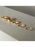 Daisy London gold ring with star engraving (British brand)