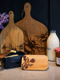 Selbrae House oak paddle board with bee engraving, imported from the UK