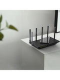 TP-Link Archer AXE75 tri-band Wi-Fi 6E router, imported from the UK