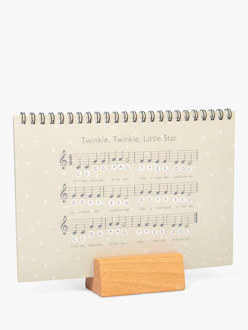 John Lewis toy wooden piano with spotty design (British brand)