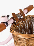 Banwood balance bike with wicker basket and bell, imported from the UK