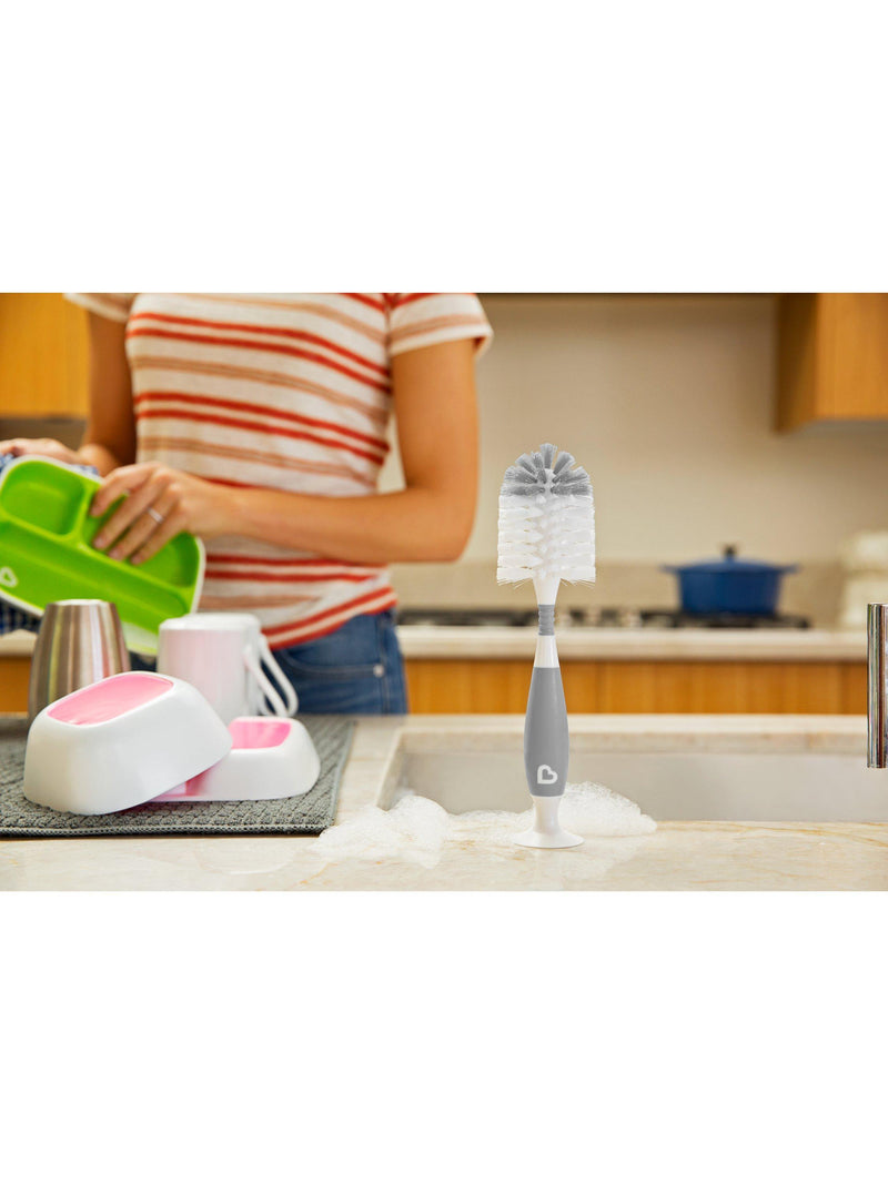 Munchkin grey bristle baby bottle brush with teat brush and suction base, imported from the UK