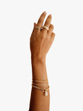 LARNAUTI freshwater pearl drop mesh bracelet in gold, imported from the UK