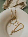 LARNAUTI freshwater pearl drop mesh bracelet in gold, imported from the UK