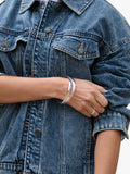 Jon Richard interlocking silver bangles, UK version