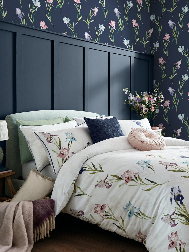 Laura Ashley floral watercolour wallpaper with iris pattern in midnight seaspray, UK version